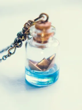 Golden origami paper boat bottle pendant necklace